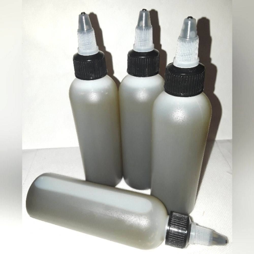 HAND crafted Neem and Amla hair and body oil